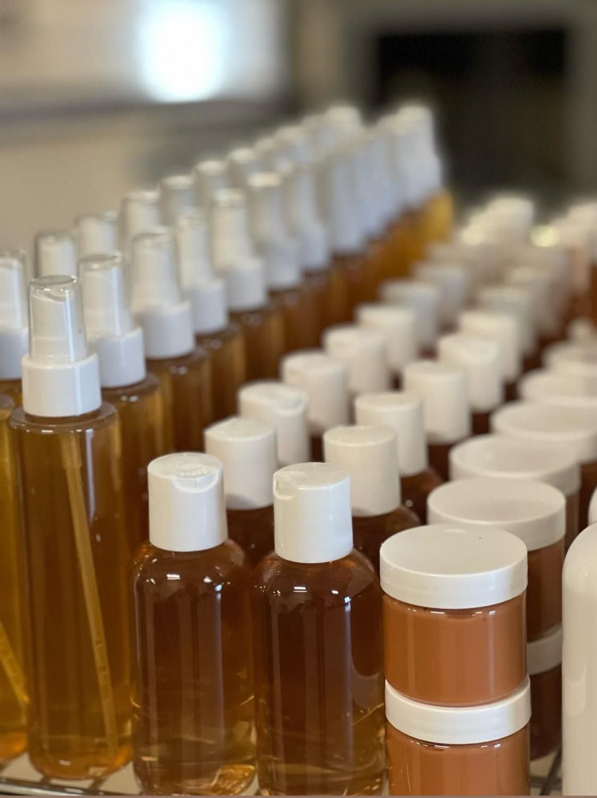 Sprays et pots ambrés en production